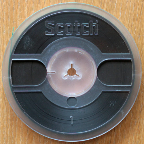 Scotch 215 Superlife • Bande magnétique avec boîtier • Magnetonband • Magnetic tape with box • Ø 13 cm • Occasion